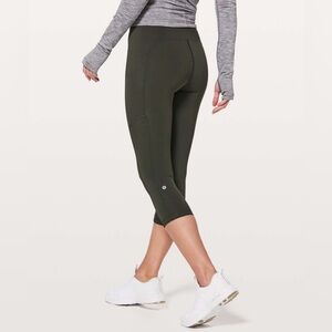 Lululemon Speed Up Crop Leggings Pants in Evergreen size 4